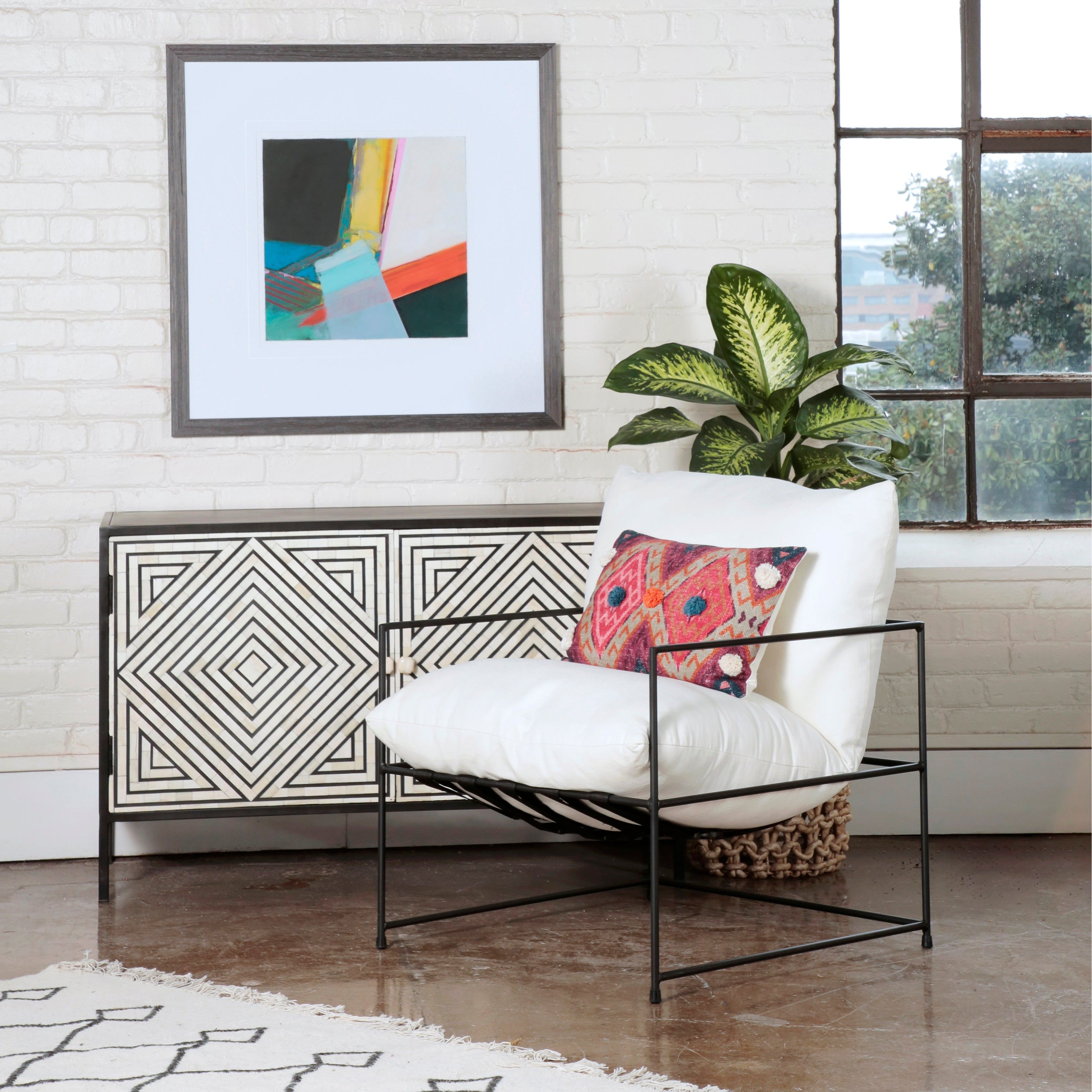 Shop chairs and discover remodeling services in the Charlotte North Carolina area. MegMade designs has been featured in Wall Street Journal for their timeless cabin home design style. Visit the MegMade store in the Ukrainian Village - Chicago area.