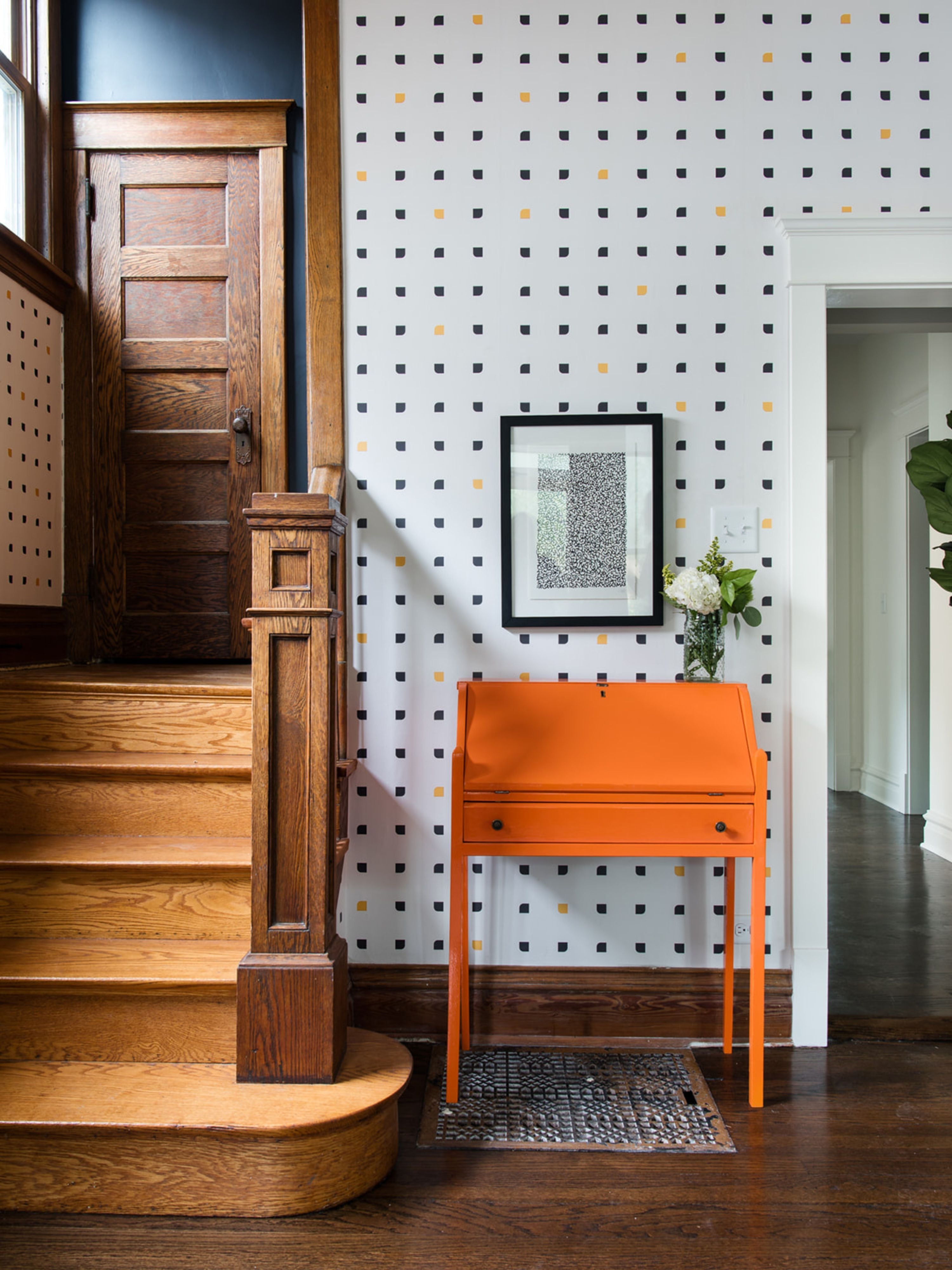A DIYed piece of furntiure in an entryway of a home