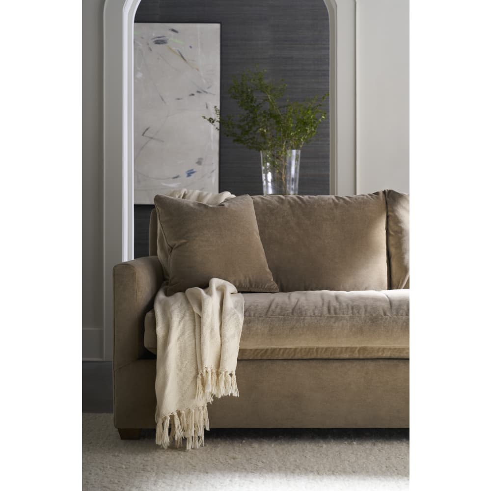 Manufacturer room photograph of the Lilah sofa in Straw fabric 20043-28; room accessories not included.